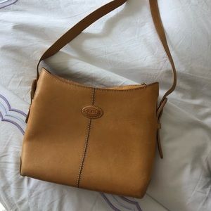Tod’s leather trimmed boutique tote bag